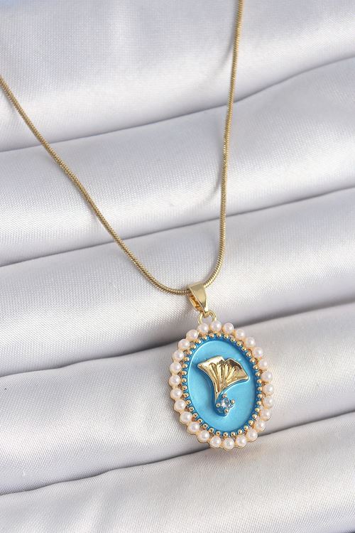 316L Çelik Gold Renk Zincir Mavi Mineli İncili Zirkon Taşlı Çiçek İşlemeli Portre Model Kadın Kolye